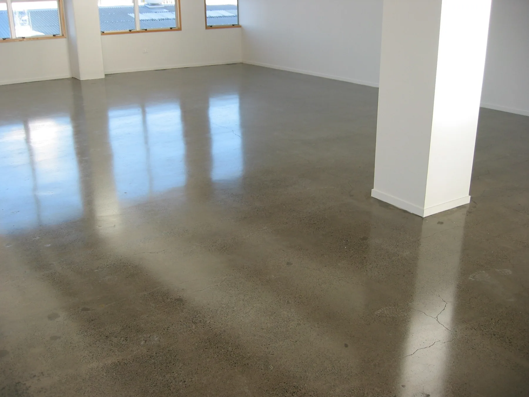 Polished concrete and grind and seal natural concrete floor finish