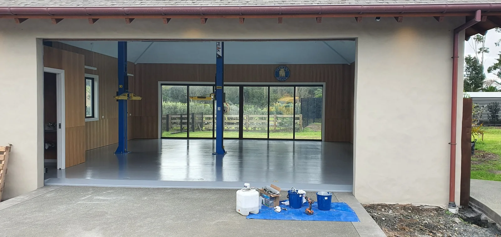 Sparta-Guard solid grey polyaspartic garage floor in a large private garage